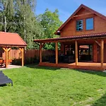 Nad Kalwą - Mazury Całoroczny Dom Do Wynajęcia Z Widokiem Na Jezioro - Pomost - łódka - Rower Wodny Pasym
